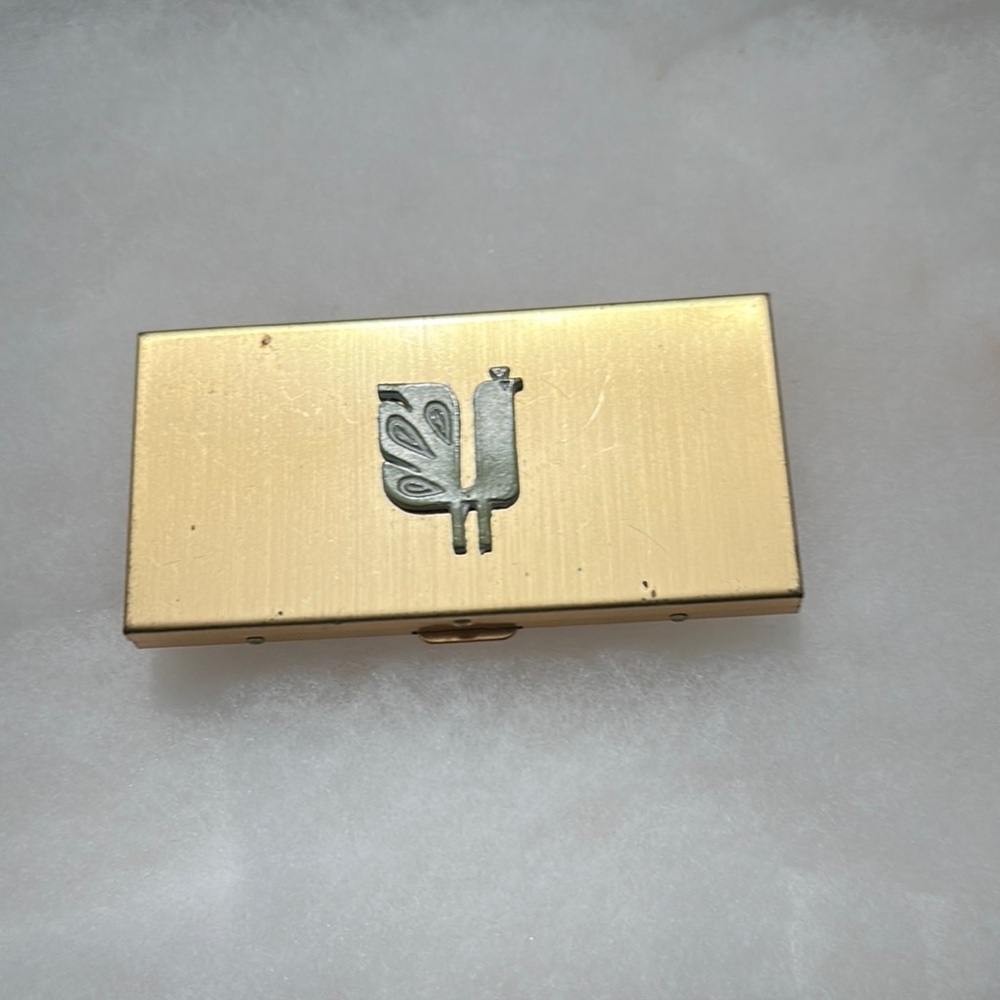 Gold tone business card holder